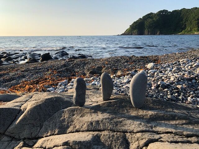 Rock balancing on the beach