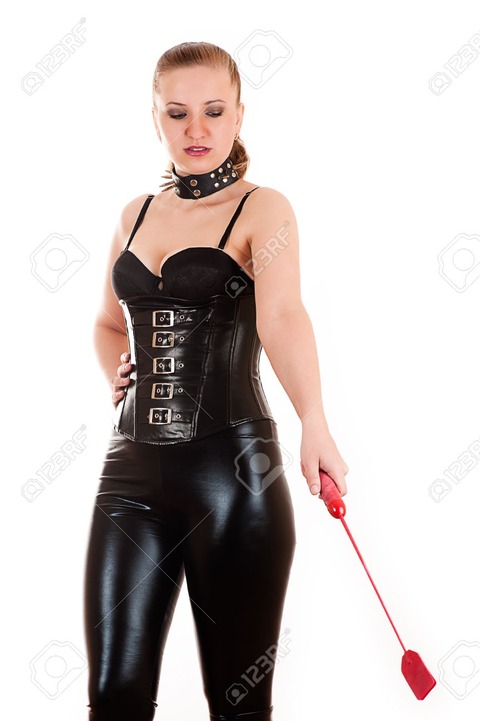 29384802-sexy-woman-in-the-image-of-mistress-gives-the-command