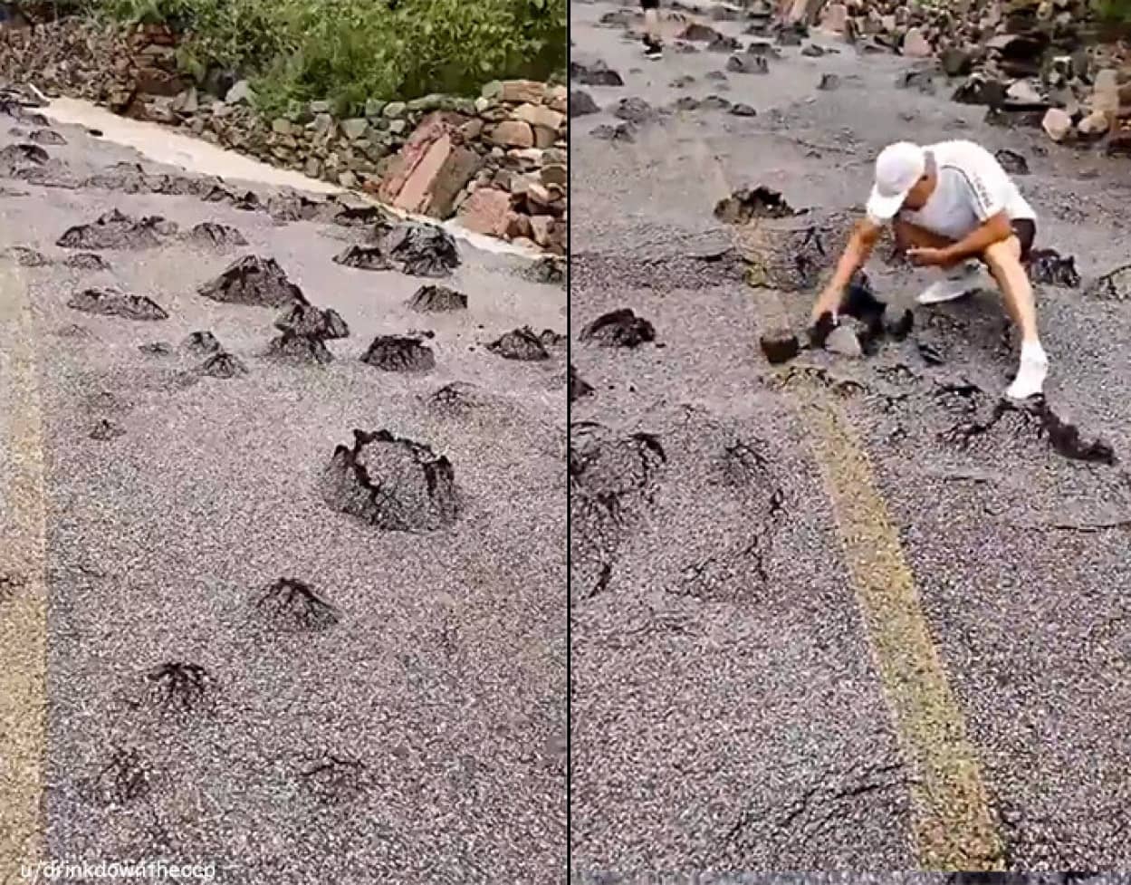洪水後、道路が膨れ上がり石が突き出る