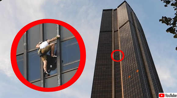 命綱なしで210mの高層ビルの窓枠をつたって素手で登った男性（高所恐怖症注意）フランス