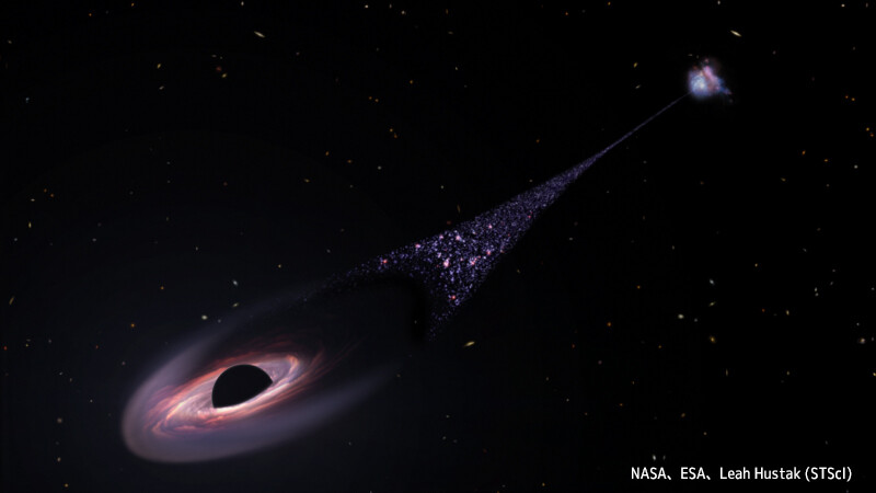 銀河から追い出されたブラックホールか？その軌跡に星々が引き寄せられているのを観測