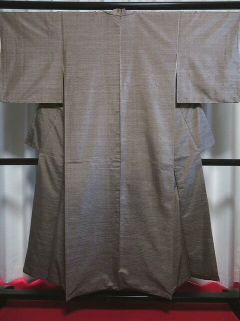 お洒落な生紬 エジプト壁画文 手摺木版染 袋帯 （玄人好み 細かな格子 