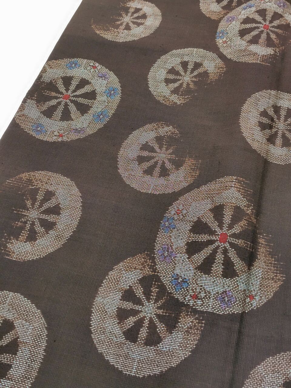 本場大島紬 証紙つき 源氏車柄〜黒兎柄の八寸名古屋帯