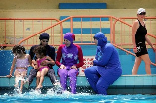 Muslim swiming in Swiss