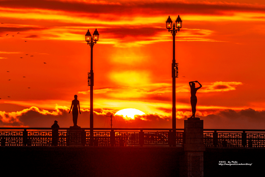 夕日色に染まる雲と幣舞橋 きままな My Photo