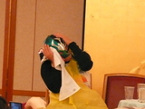 頭かかえる