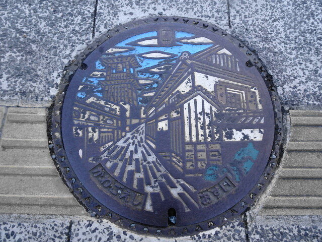 川越市汚水、時の鐘と蔵造りの街並みがデザインされている