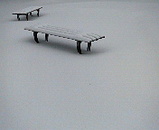 雪の中のベンチ