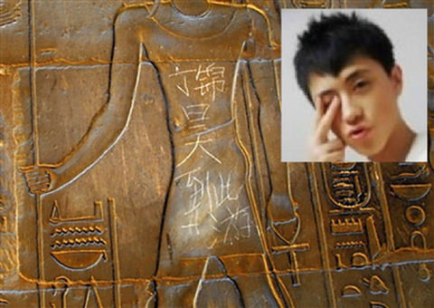 Chinese-tourists-damages-3500-year-old-temple-carving