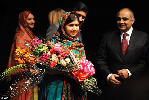 1412957680634_wps_64_Malala_Yousafzai_holds_fl