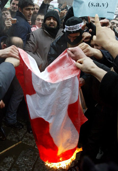 swiss-flag-burning