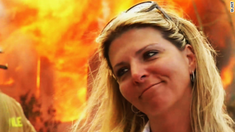 150213122038-mother-smiles-while-killers-home-burns-large-169