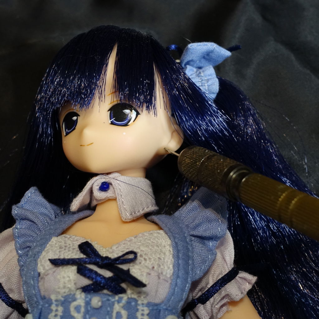 らめび 人形にピアス