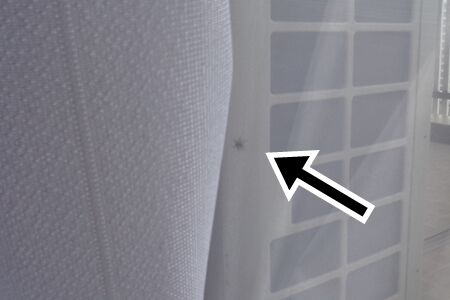 Behind the curtain is