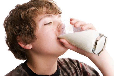 boy drinking glass of milk