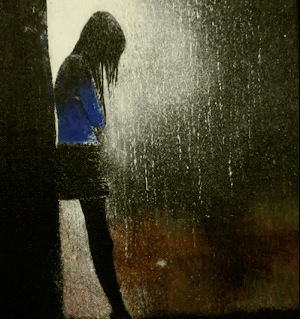 雨宿りする女の子