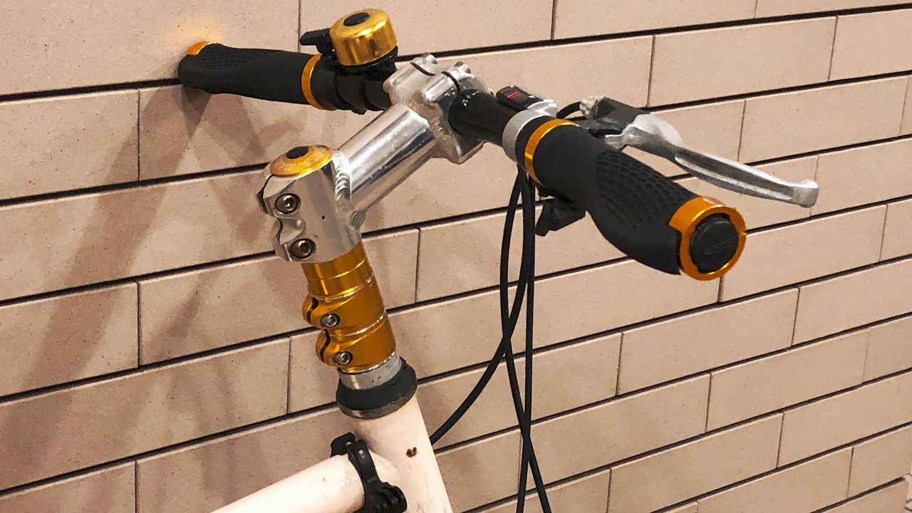 自転車 ハンドル 高 さ 延長