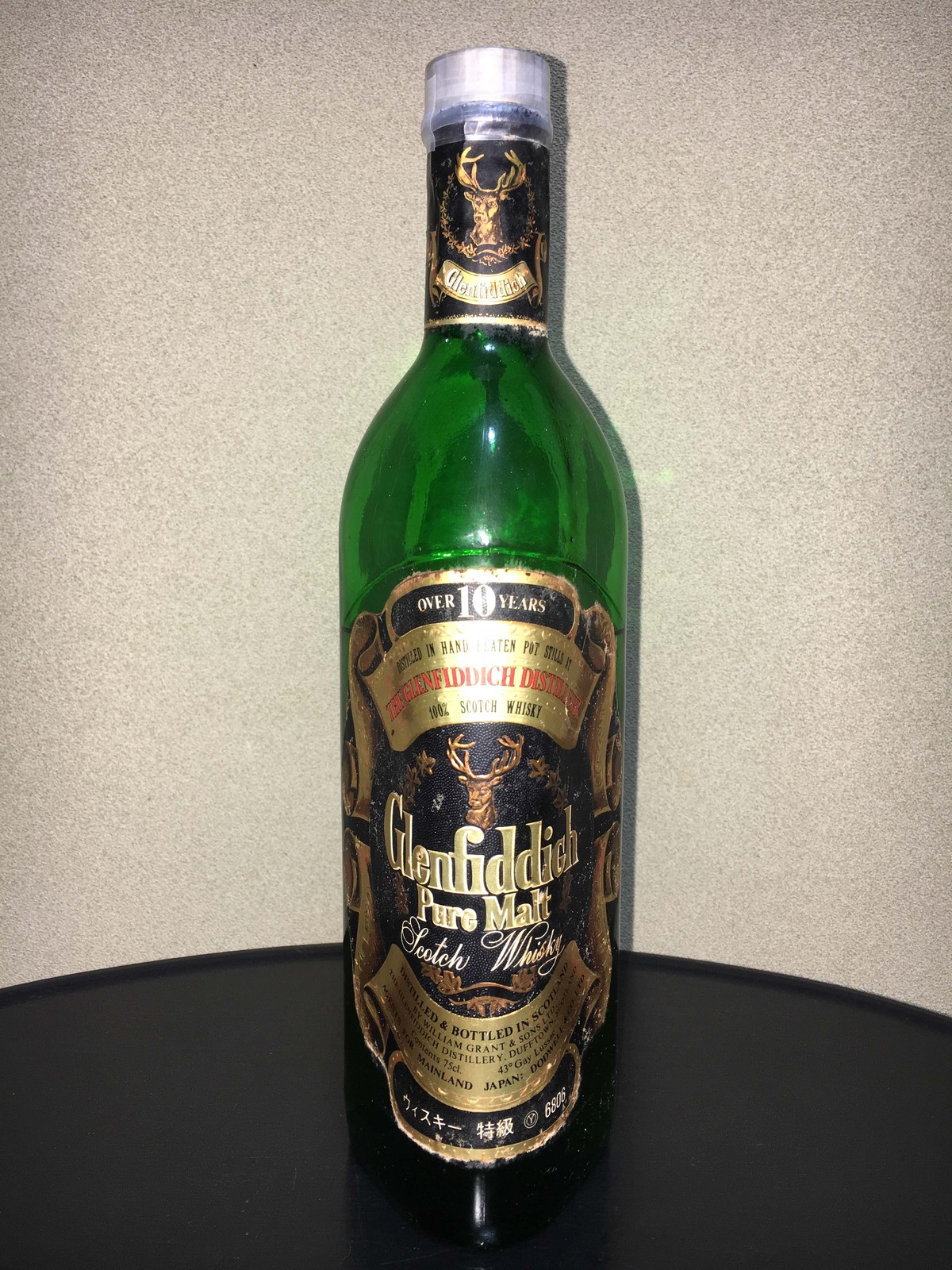 液面が大きく下がったウイスキー（グレンフィディック特級表記