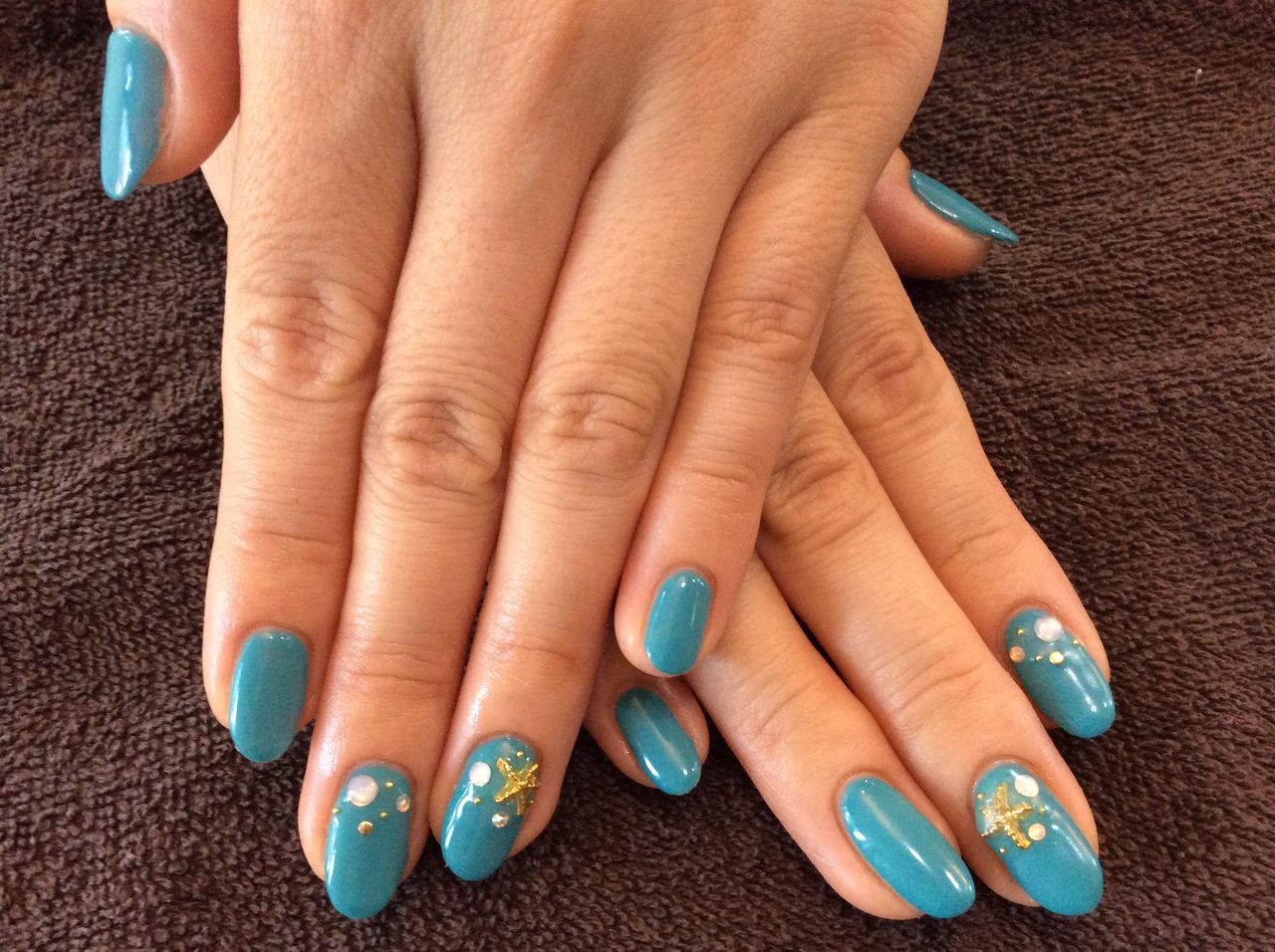 ターコイズグリーンが鮮やかな1色塗り ジェルネイル Nail Salon Freestyle