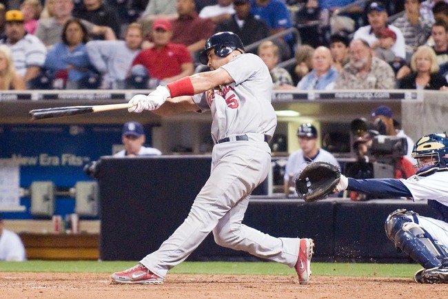 Pujols_hits_home_run_in_2008