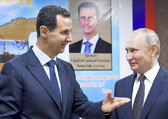 Russia's Putin visits Syria to meet A