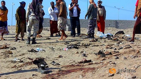 people-gather-at-the-site-of-a-suicide-bombing-in-the-southern