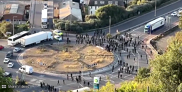 UK government condemns masked anti