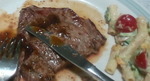 まずステーキで