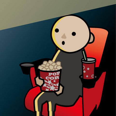 映画館で映画を見ている観客