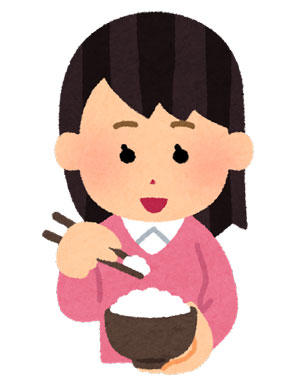 箸でご飯を食べる人