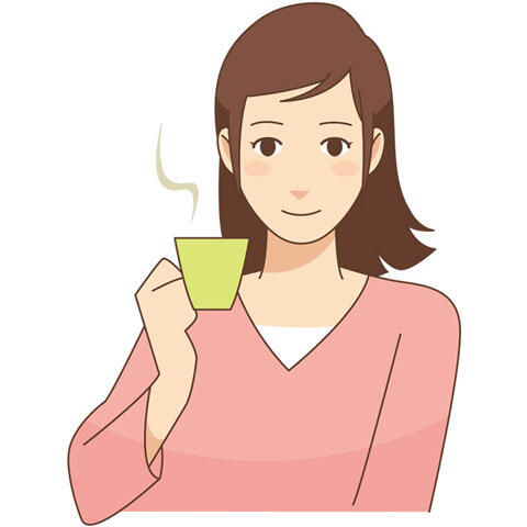 コーヒーを飲む女性