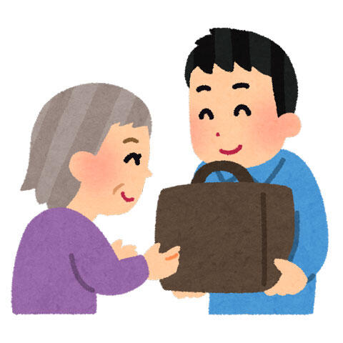 お婆さんの重そうな荷物を代わりに持ってあげる男性