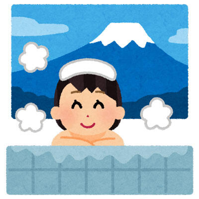 大きな富士山の描かれた銭湯でくつろいでいる女性