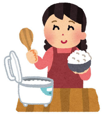 ご飯を山盛りよそっているお母さん