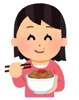 美味しそうに食べている女性