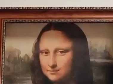 ネコ飼いだったら家にひとつは欲しい。気にいったにゃ♪ → 猫用の「モナ・リザ」はこちらです…