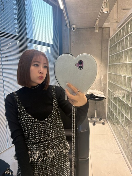 女さんのスマホケース、限界突破