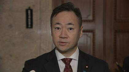 鈴木法相の月餅配布問題とその影響