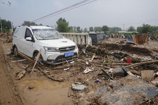 中国「豪雨で20人死んだと言ったな。あれは嘘だ」