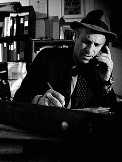 256px-Greg_Palast_in_his_NYC_office