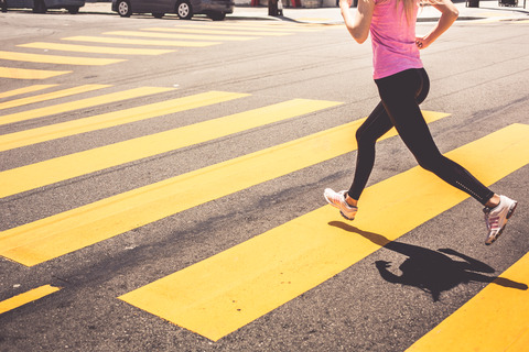 blonde-woman-running-over-the-pedestrian-crossing-picjumbo-com