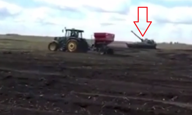 ウクライナ東部の農家は強力な護衛がついて畑仕事をしているようです！