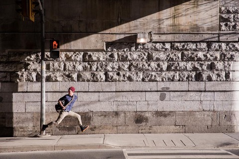 young-man-runaway-on-urban-street_925x