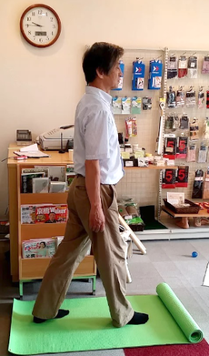 辻 左