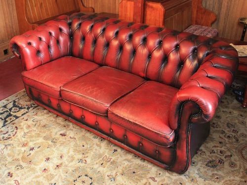Vintage Chesterfield sofa in red leather