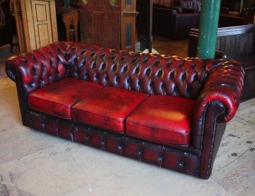 Three seat oxblood leather Chesterfield sofa