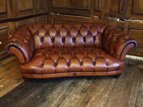 Vintage brown leather Chesterfield-style two seater sofa