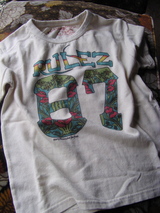 87 tee