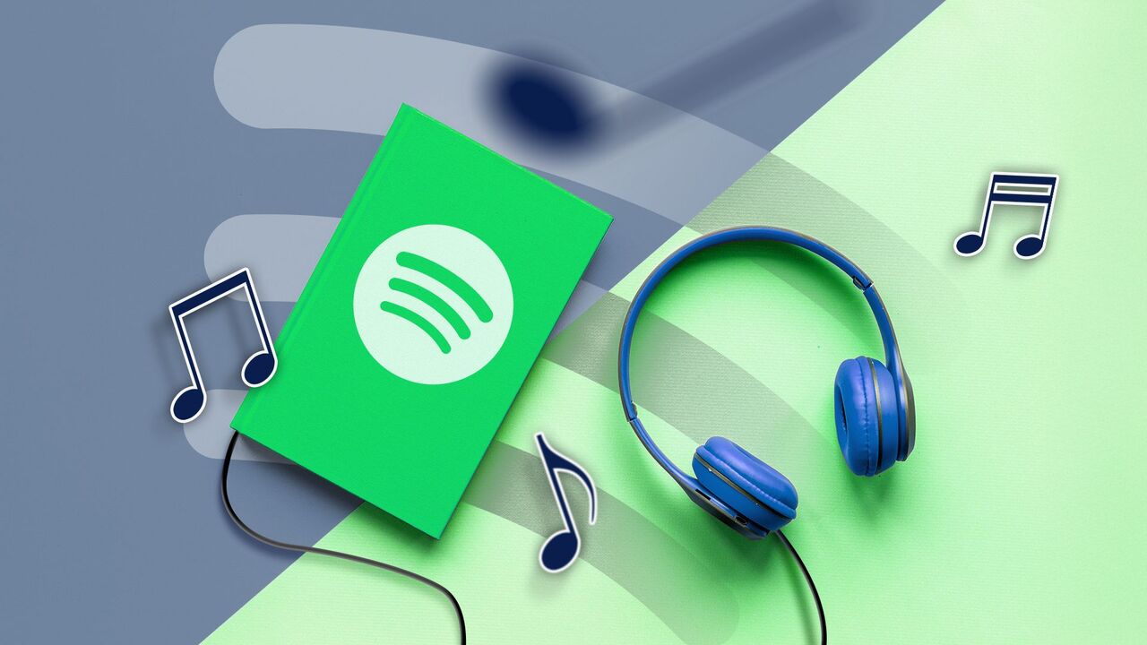   ヘッドフォンの横に Spotify のロゴがあり、その周りにいくつかの音楽記号が描かれた本。