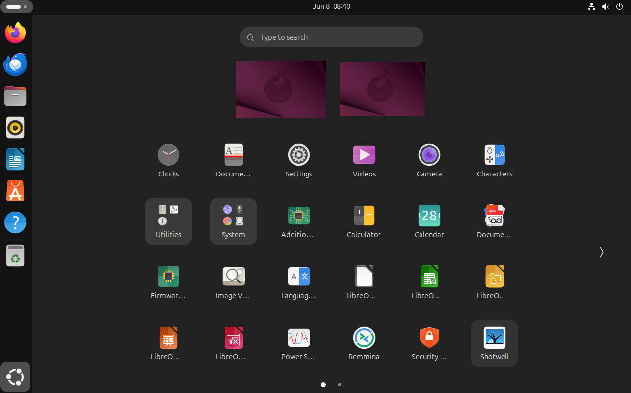 アプリケーション起動メニューにいくつかのアプリケーションが表示されている Ubuntu 25.04 デスクトップ。